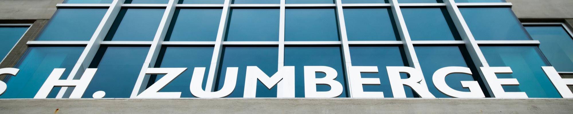 J. H. Zumberge Hall sign